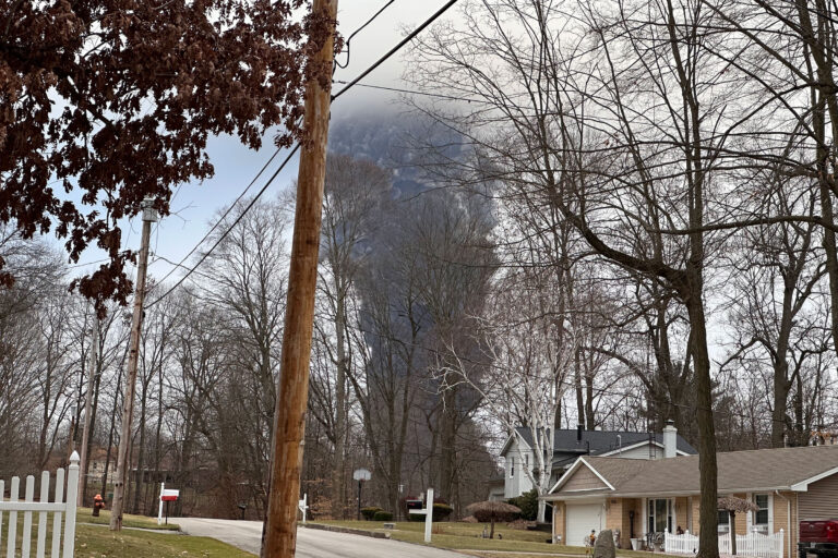 Released chemicals rise from the ground like a mushroom cloud in a residential neighborhood.
