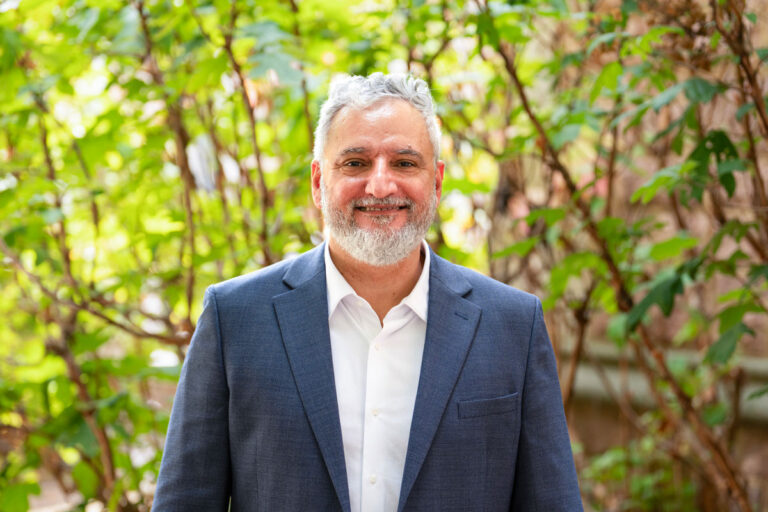 photo of Rodrigo Reis in front of trees, portrait