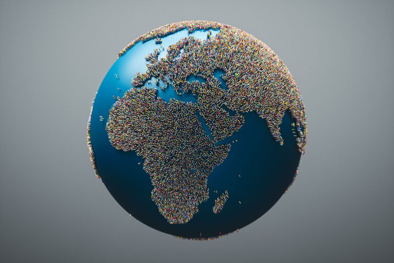 globe with the shape of the continents made up of tiny people