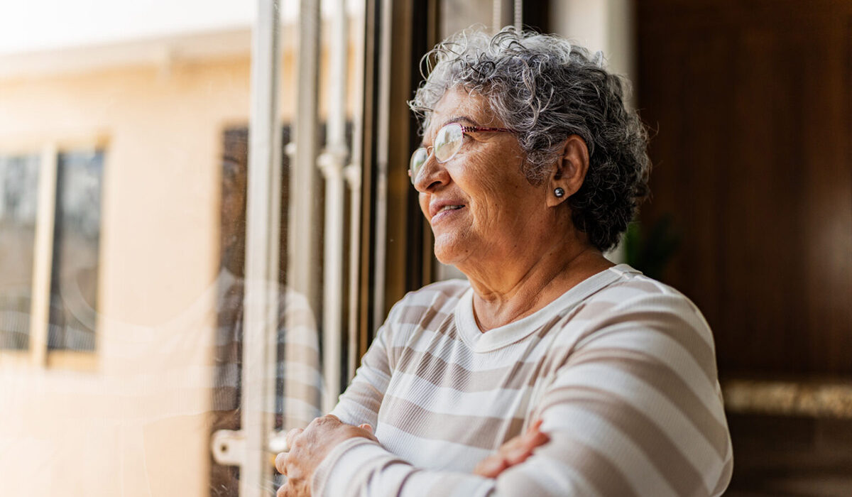 Senior woman contemplating at home